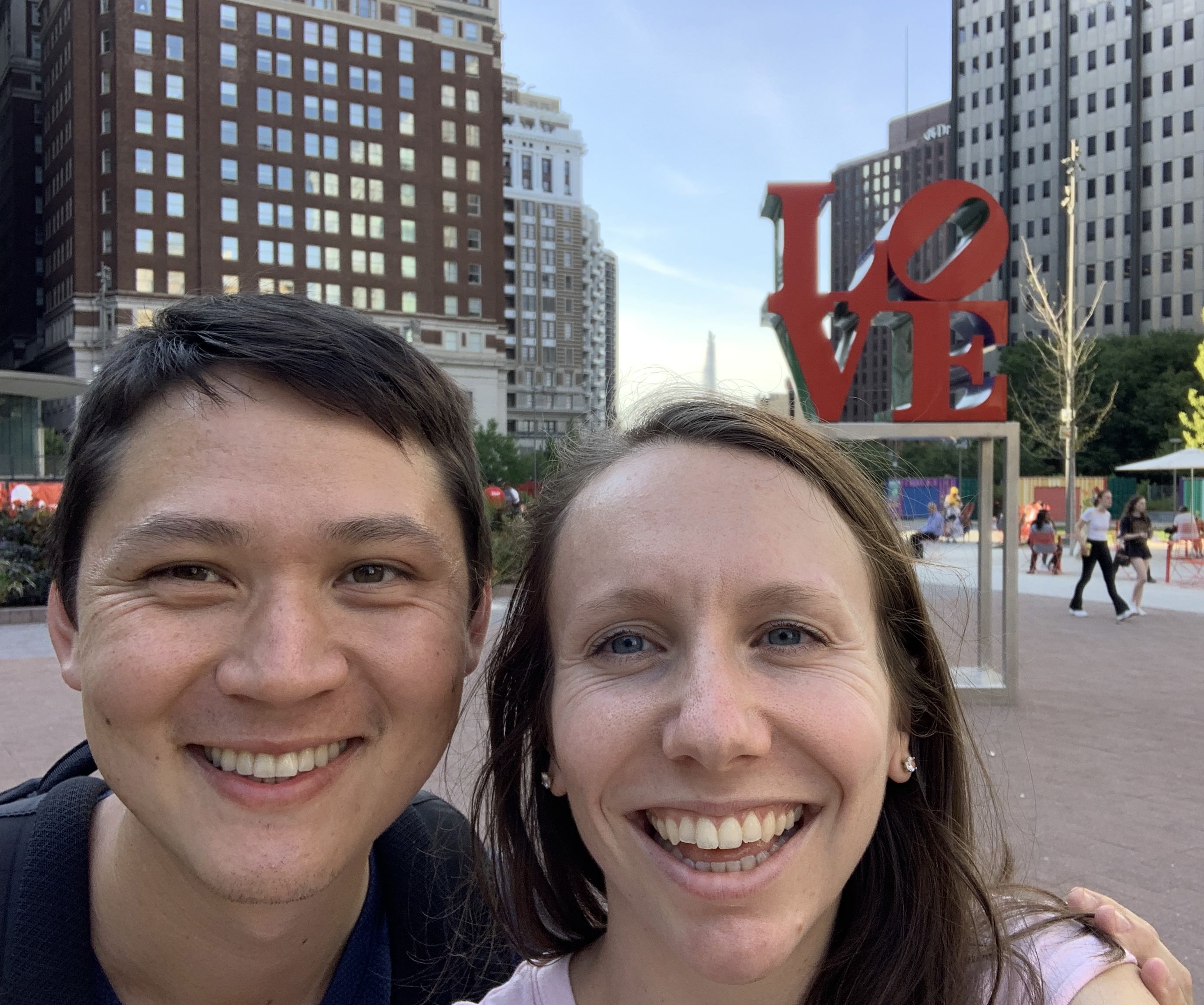 Selfie of Matt and Mary in front of the Love sign in Philadelphia.